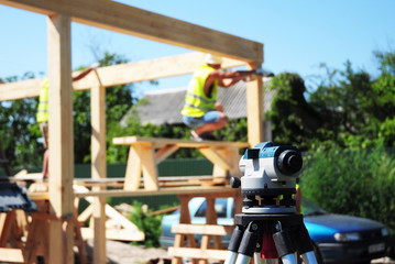 A close-up on theodolite, tacheometer, builder's level, optical instrument used for angular...