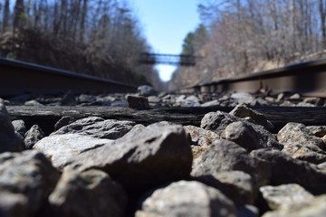 A closeup of gravel on some train tracks