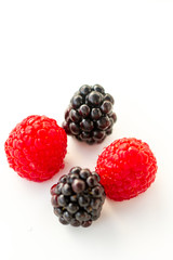 Close-up of berries on white background