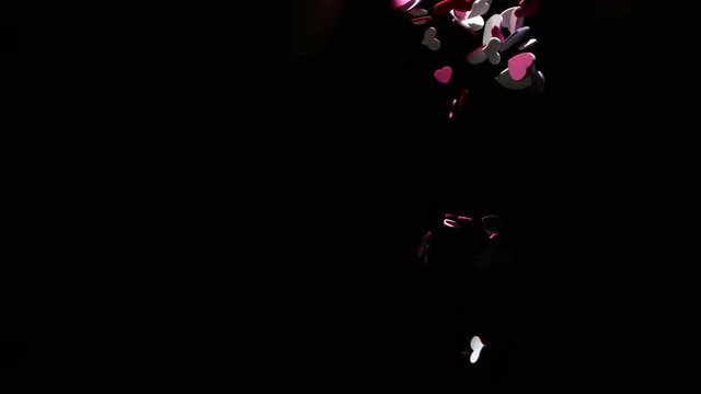 Love heart confetti falling