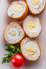 Scotch egg meat balls on rustic wooden background