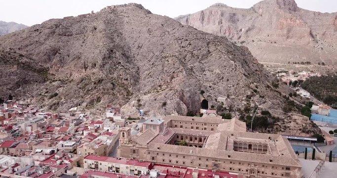 ORIHUELA, SPAIN - APRIL 17, 2019: High view of Orihuela in Alicante with old University, mountains and buildings