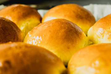 Freshly baked burger buns close up