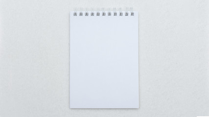 White notepad, top view, copy space