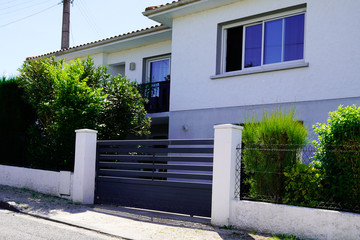 modern gray gate aluminum portal of outdoor suburb house