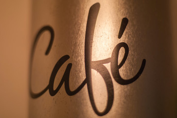 Close-up Of Caf Text On Wall