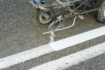 road painting and driving directions, road repair marking on asphalt pavement