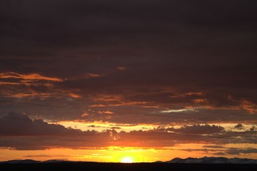 Orange sunset at the beginning of the Polar summer