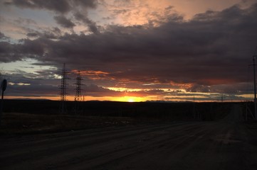 Orange sunset at the beginning of the Polar summer