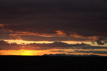 Orange sunset at the beginning of the Polar summer