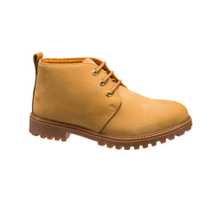 autumn hiking boots in tan with lace-up tread isolated on a white background