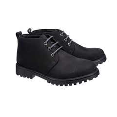 black autumn shoes boots with lace-up tread isolated on white background