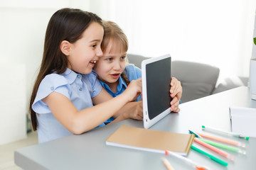 Learning from home, Home school kid concept. Little children study online learning from home with laptop. Quarantine and Social distancing concept.