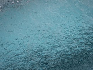 Ice structures on the black lava beach, placed near Jokulsarlon glacier lagoon.