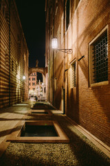 Fototapeta na wymiar evening italian streets in verona. evening italian streets in verona. Ancient buildings and old town streets of Italy