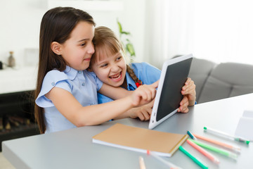 Learning from home, Home school kid concept. Little children study online learning from home with laptop. Quarantine and Social distancing concept.