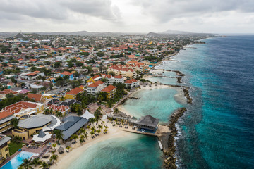 Aerial view of coast of Curacao in the Caribbean Sea with turquoise water, cliff, beach and...