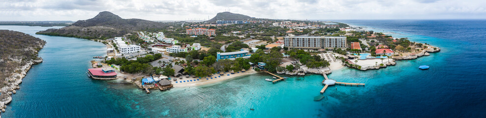 Aerial view of coast of Curacao in the Caribbean Sea with turquoise water, cliff, beach and...