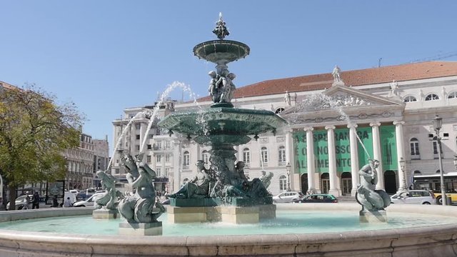 fountain in Rossio square dowtown Lisbon, Portugal slow motion