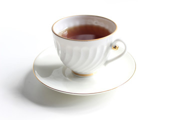tea in cup isolated on white background