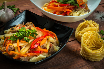 lagman homemade noodle soup on a wooden table