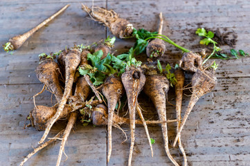 Pile of parsnip on display in food market
