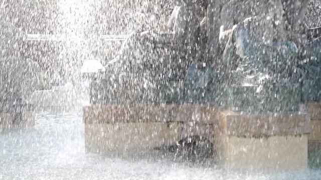 fountain in Rossio square dowtown Lisbon, Portugal slow motion
