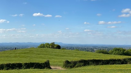 Obraz premium landscape with blue sky and natural hedge walls looking towards Wales.