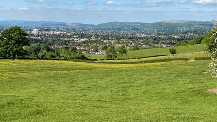 Fototapeta na wymiar Lower slopes of Leckhampton Hills looking over Cheltenham towards winchcombe and Cleeve Hills