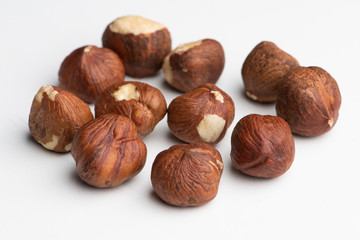 Hazelnuts on a white background