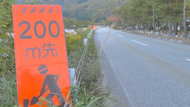 A 200m signage on the side of the river in Kurobe Japan