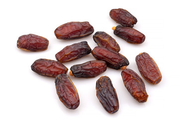 Organic and Fresh Medjool dried Dates, close-up, isolated on white background.