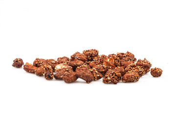 Organic sauce covered peanuts on white background