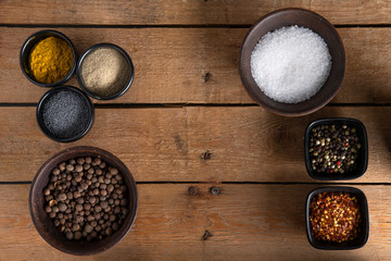 Bowls of Spices on a wooden table