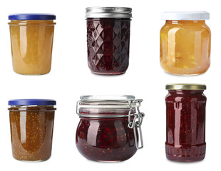 Set of different jars with jams on white background