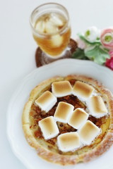 Marshmallow and sugar pizza on dish for sweet food