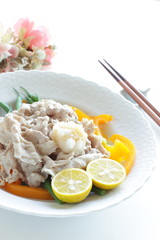 Japanese food, boiled pork slice served with lemon and vegetable