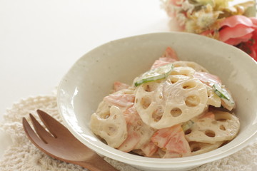 Homemade lotus root and mayonnaise salad with cucumber and carrot
