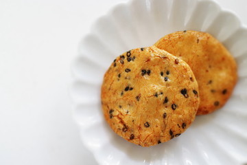 Japanese food, black sesame rice cracker on dish