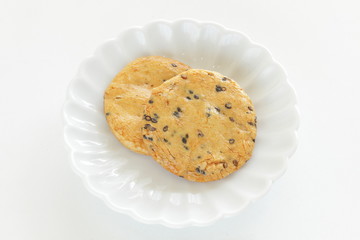 Japanese food, black sesame rice cracker on dish