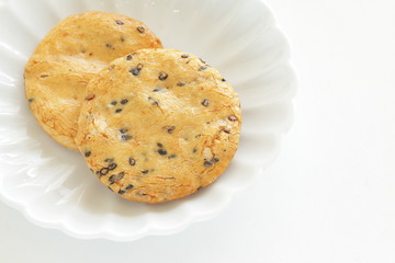 Japanese food, black sesame rice cracker on dish