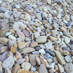 Close up of rounded and polished beach rocks
