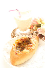 Cheese and mince meat French bread on white dish for breakfast