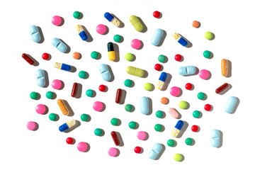 seamless pattern of many different capsules and pills 