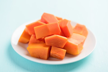 Slices of ripe papaya fruit on plate, Tropical fruit