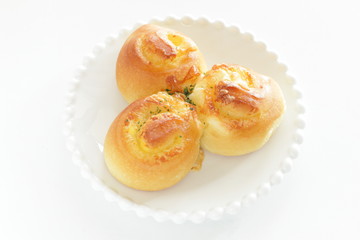 Garlic bread on white dish with copy space