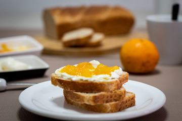 toast with sour crem cheese and marmalade