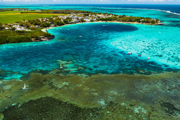 Fototapeta na wymiar Aerial photography of the East coast of the island of Mauritius. Beautiful lagoon of the island of Mauritius, taken from above.Indian ocean coral reef