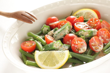 Homemade cherry tomato and Okra with sesame dressing salad