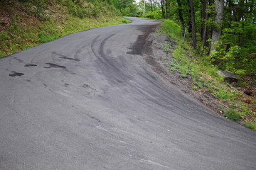 Switchbacks on Mountain Drive to Top with Tire Marks